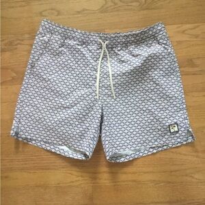 Marine layer board short.  Pinkish/lavender/indigo Japanese wave design.